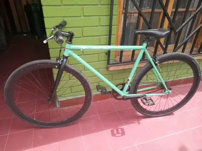 Bicicleta fixie verde menta - miniatura 1