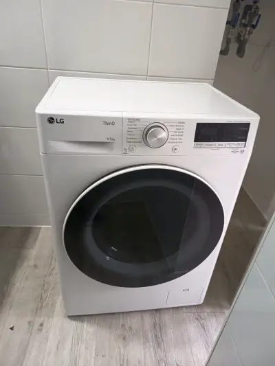 Lavadora secadora LG ThinQ 9/5kg blanca - miniatura 1