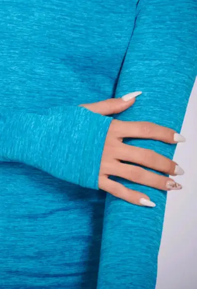 Polera deportiva azul con cuello alto - miniatura 2