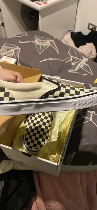 Zapatillas slip-on a cuadros blanco y negro vans - miniatura 1