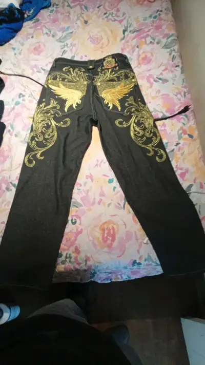 Jeans negros con diseño dorado para hombre - miniatura 2