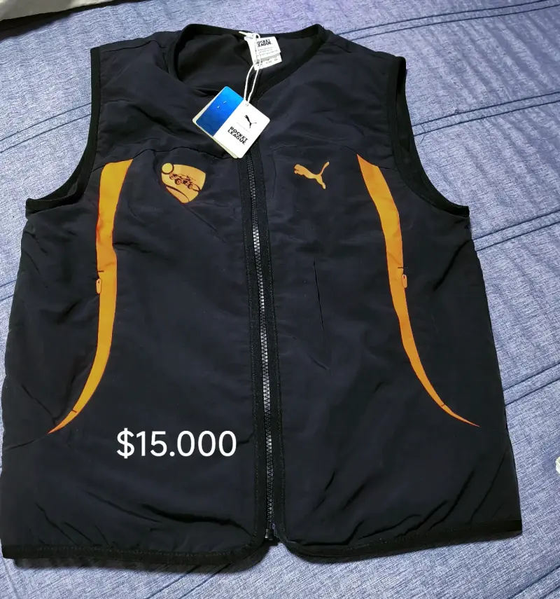 Chaqueta deportivo Puma negro y naranja - 1