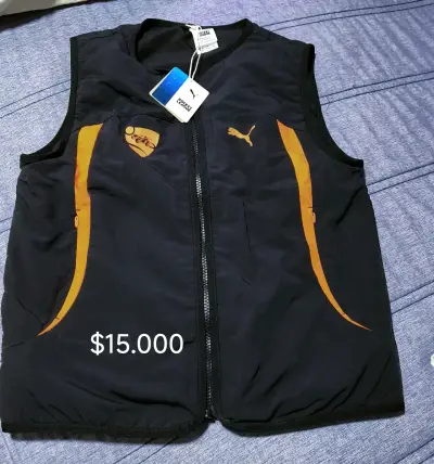 Chaqueta deportivo Puma negro y naranja - miniatura 1