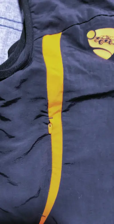 Chaqueta deportivo Puma negro y naranja - miniatura 6