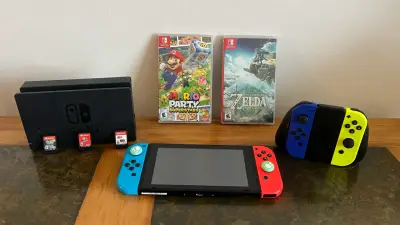 Nintendo Switch + 2 pares Joy-Con + 5 juegos - miniatura 1