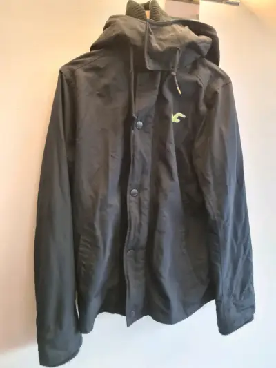Chaqueta impermeable con capucha verde - miniatura 2
