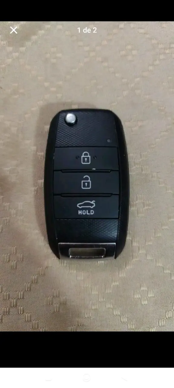 Llave con control remoto integrado para autos Kia - 1