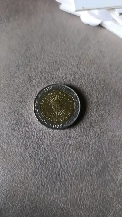 Moneda argentina de un peso 2009 - miniatura 1