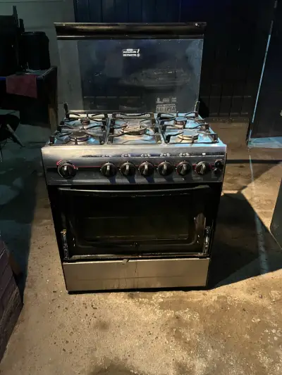 Cocina a gas con horno y 6 quemadores - miniatura 1