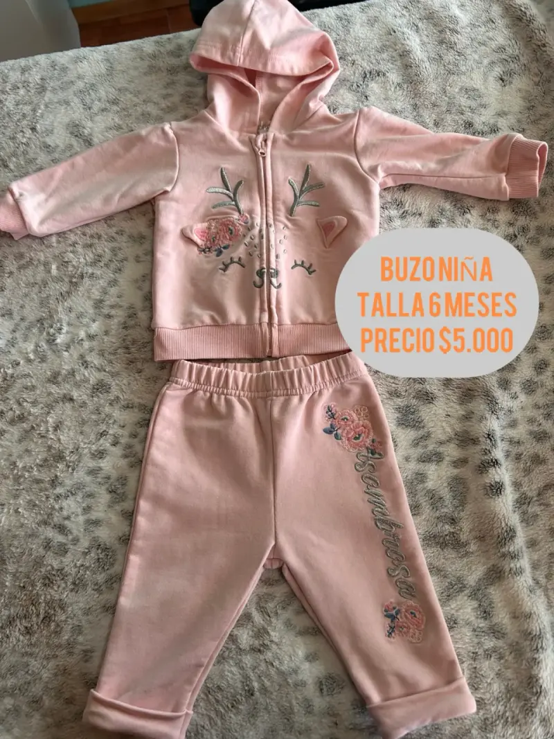 Buzo rosado para niña talla 6 meses