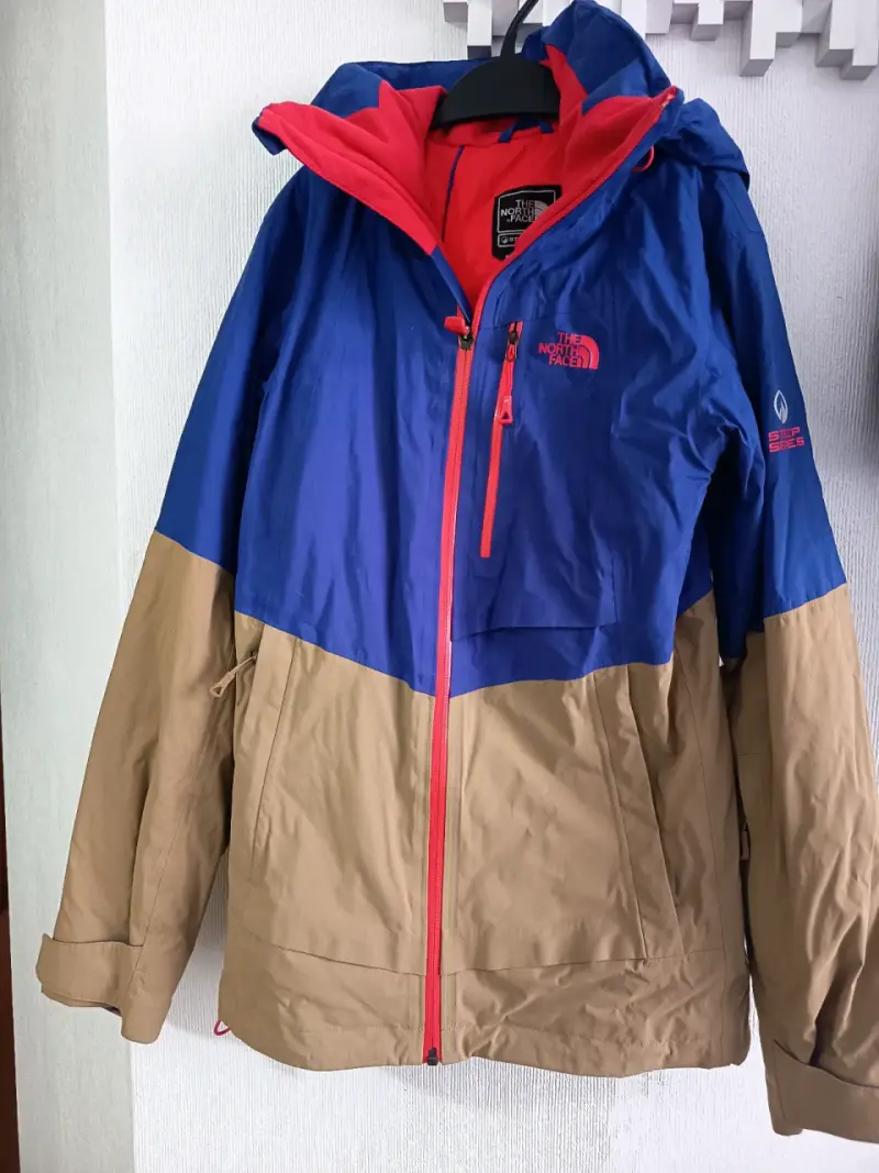Chaqueta impermeable The North Face azul y beige - 1