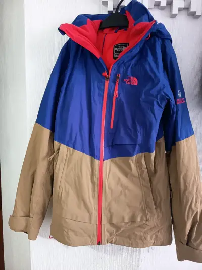 Chaqueta impermeable The North Face azul y beige - miniatura 1