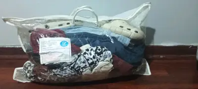 Bolsa con ropa - miniatura 1