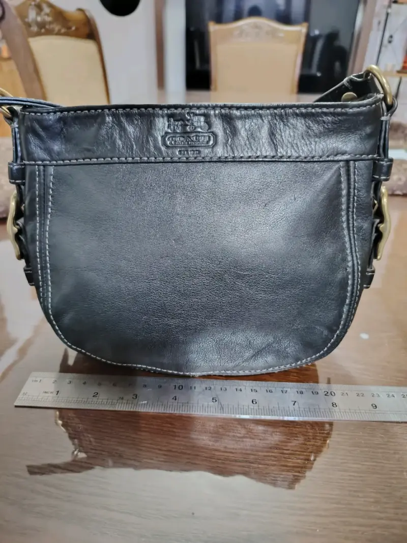 Bolso de cuero negro Coach elegante - 1