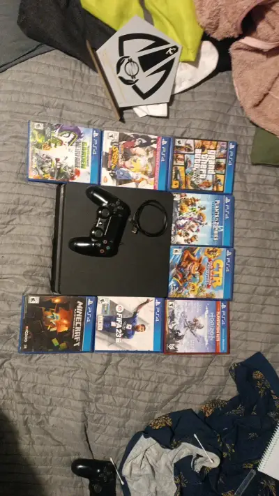 Consola PS4 con juegos y control - miniatura 1