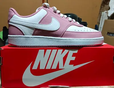 Zapatillas deportivas Nike rosa y blanco - miniatura 1