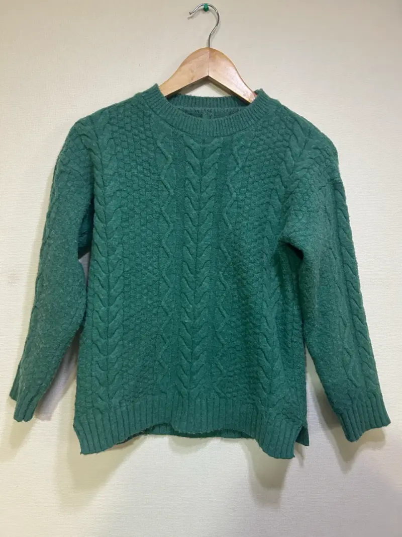 Suéter verde de lana tejido para hombre