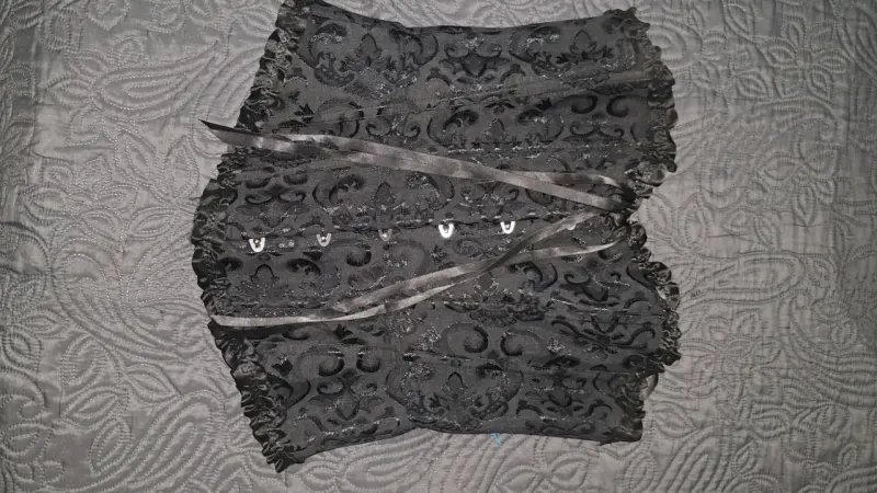 Corset negro de encaje elegante