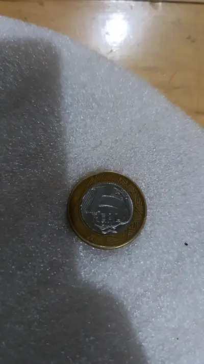 Moneda un real de brasil - miniatura 3