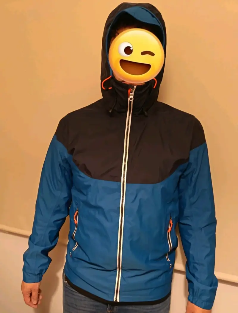 Chaqueta cortaviento azul con capucha - 1