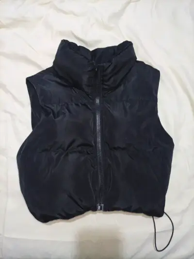 Chaqueta sin mangas negro - miniatura 1