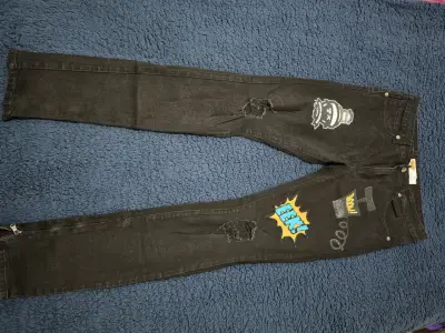 Jeans negros con parches estilo urbano - miniatura 1