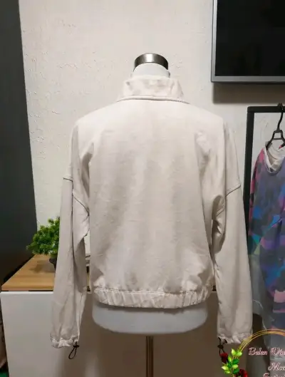 Polerón blanco CK Performance con cierre - miniatura 2