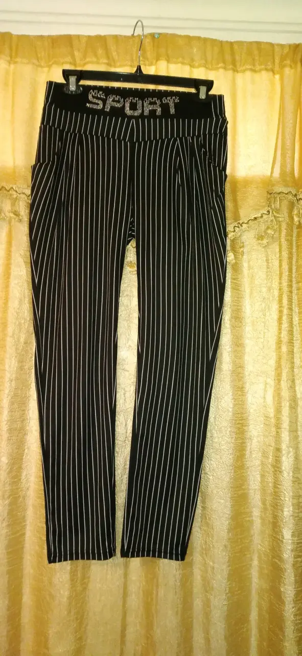 Pantalones calza rayados negros para mujer - 1