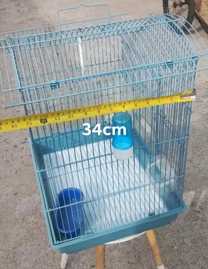 Jaula para pájaros azul con accesorios - 1