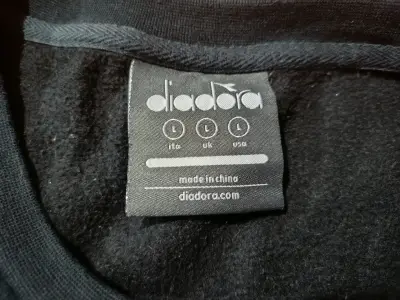 Poleron Marca Diadora - miniatura 2