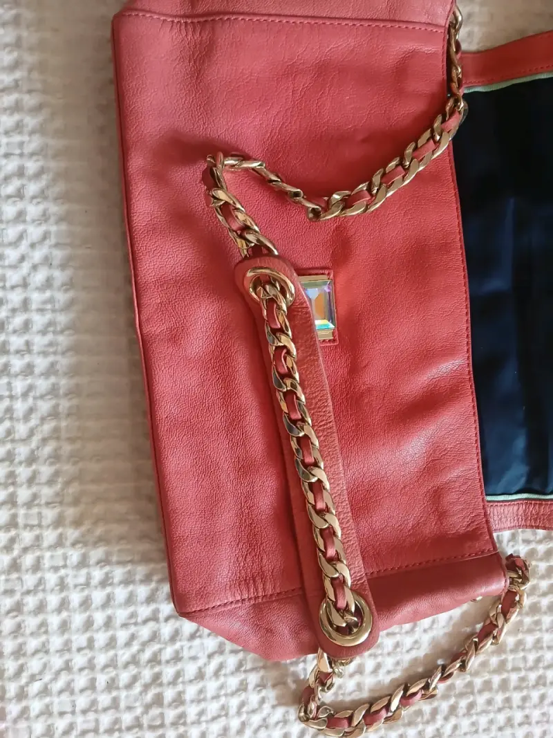 Cartera de cuero rosada. - 3