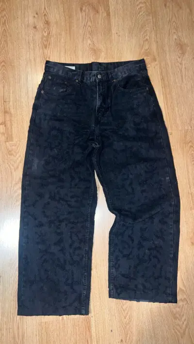 Jeans Zara negros baggy con efecto roturas - miniatura 1