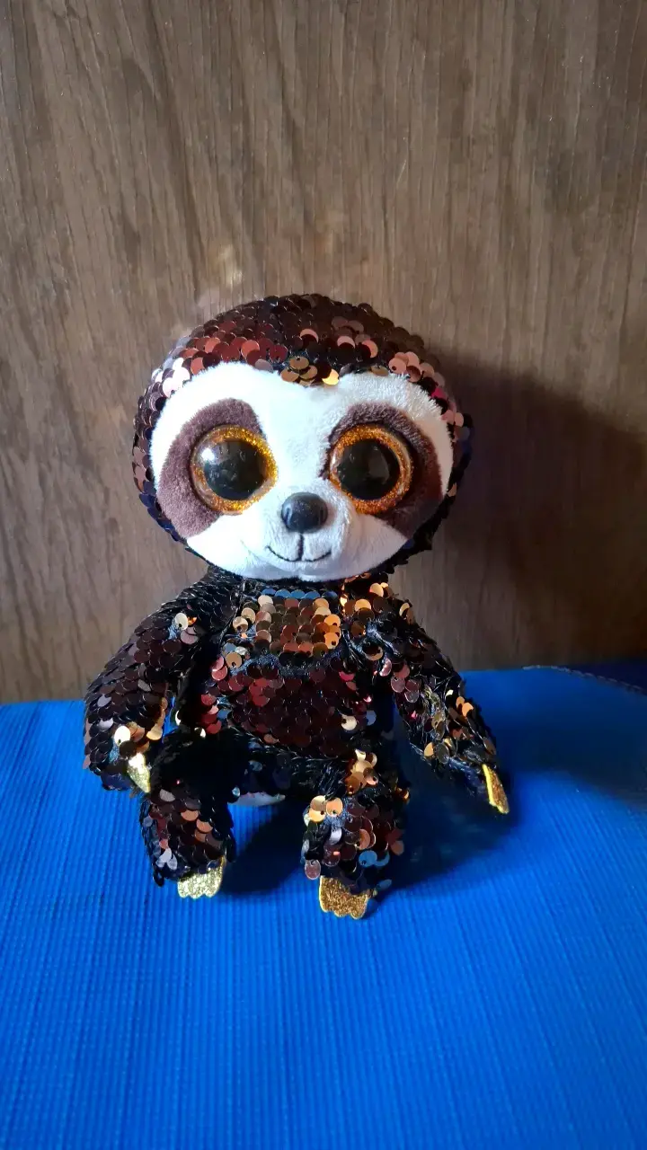 Peluche de perezoso con lentejuelas reversibles