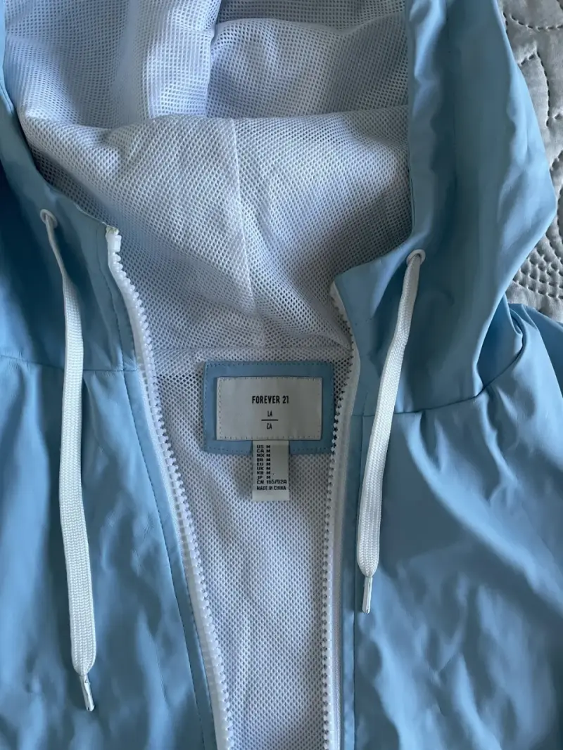 Chaqueta cortaviento azul pastel - 2