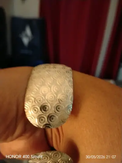 Brazalete de plata con diseño circular - miniatura 1