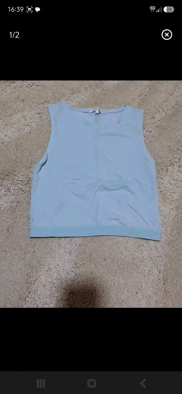 Polera sin mangas azul claro para mujer - 1