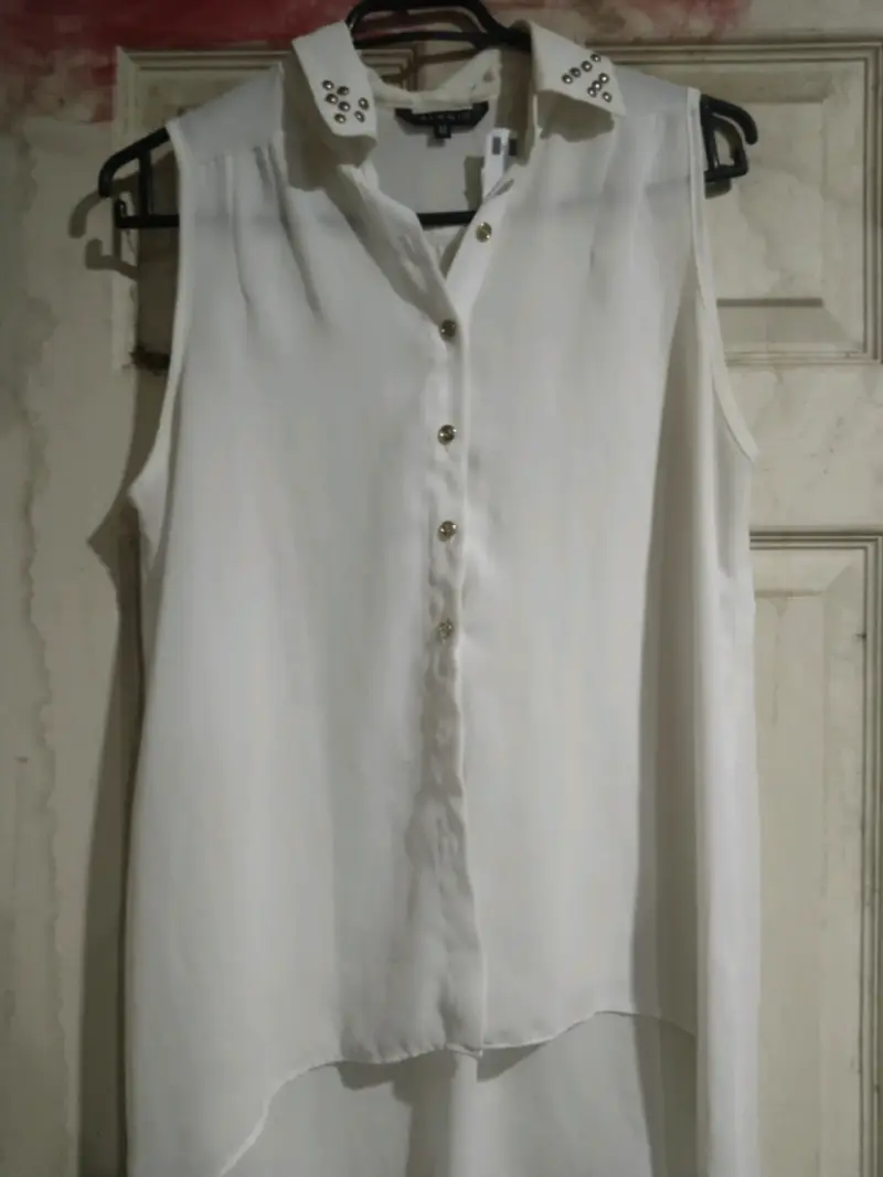 Blusa sin mangas blanca - 1