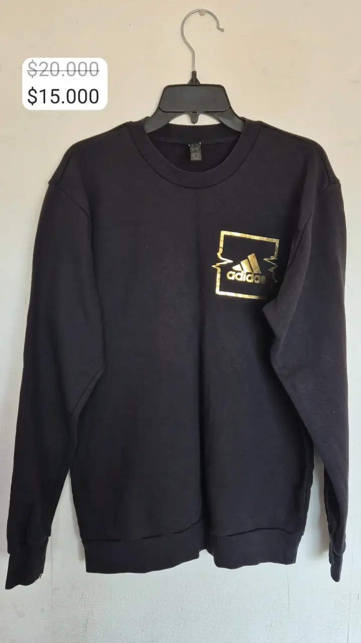 Polerón negro Adidas con logo dorado