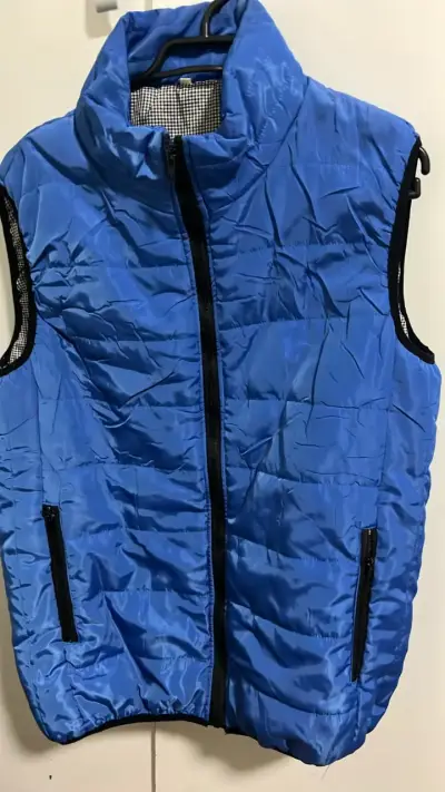 Chaleco acolchado azul sin mangas para hombre - miniatura 1