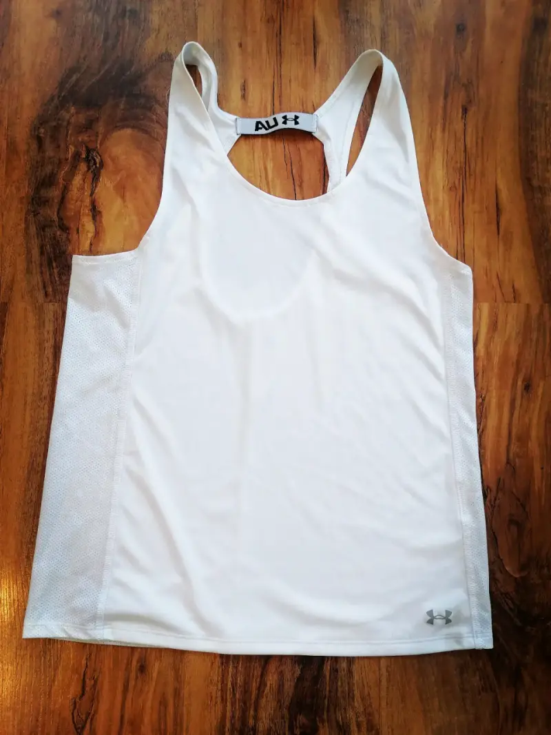 Polera deportiva blanca Under Armour para mujer