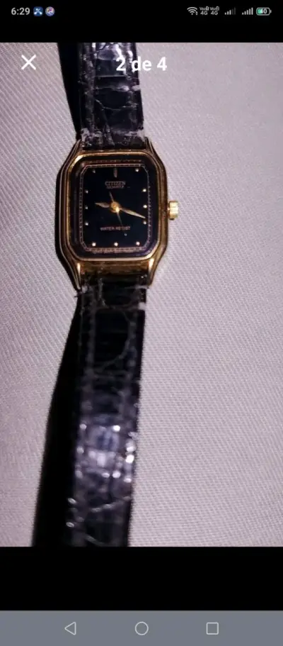 Reloj Citizen Quartz dorado con correa negra - miniatura 1