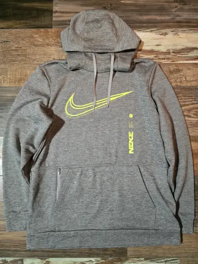 Polerón con capucha gris Nike con logo amarillo - miniatura 1