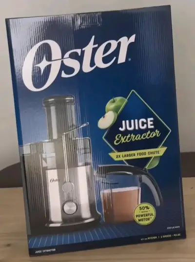 Extractor de jugos Oster de acero inoxidable - miniatura 1