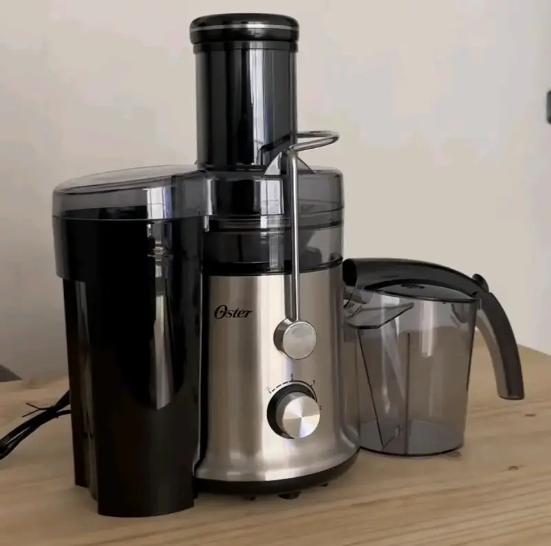 Extractor de jugos Oster de acero inoxidable - 2