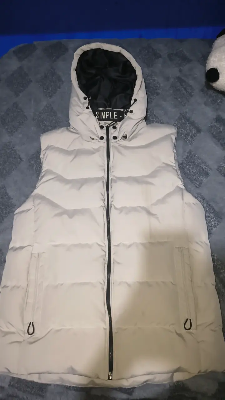 Chaqueta sin mangas y capucha desmontable - 1