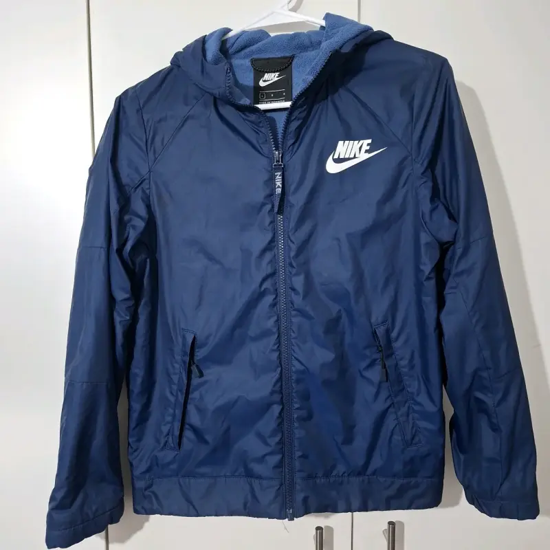Chaqueta deportiva Nike azul con capucha talla 12. - 1