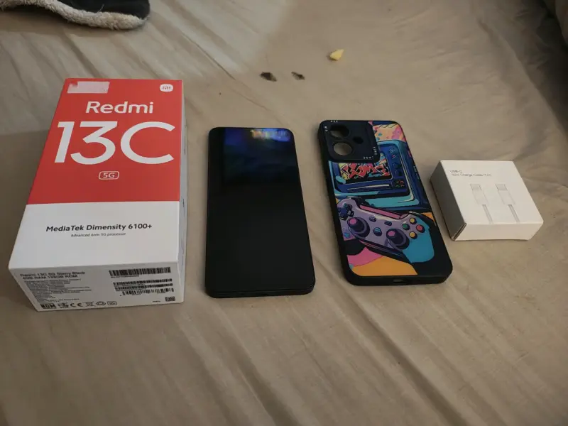 Smartphone Redmi 13C 5G con funda y cable - 1