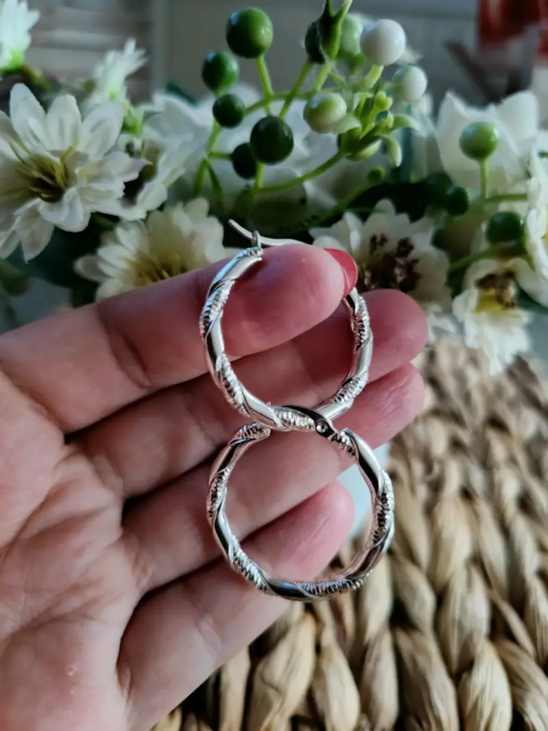 Aros de plata estilo trenzado