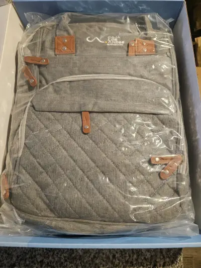 Mochila gris con detalles de cuero - miniatura 1