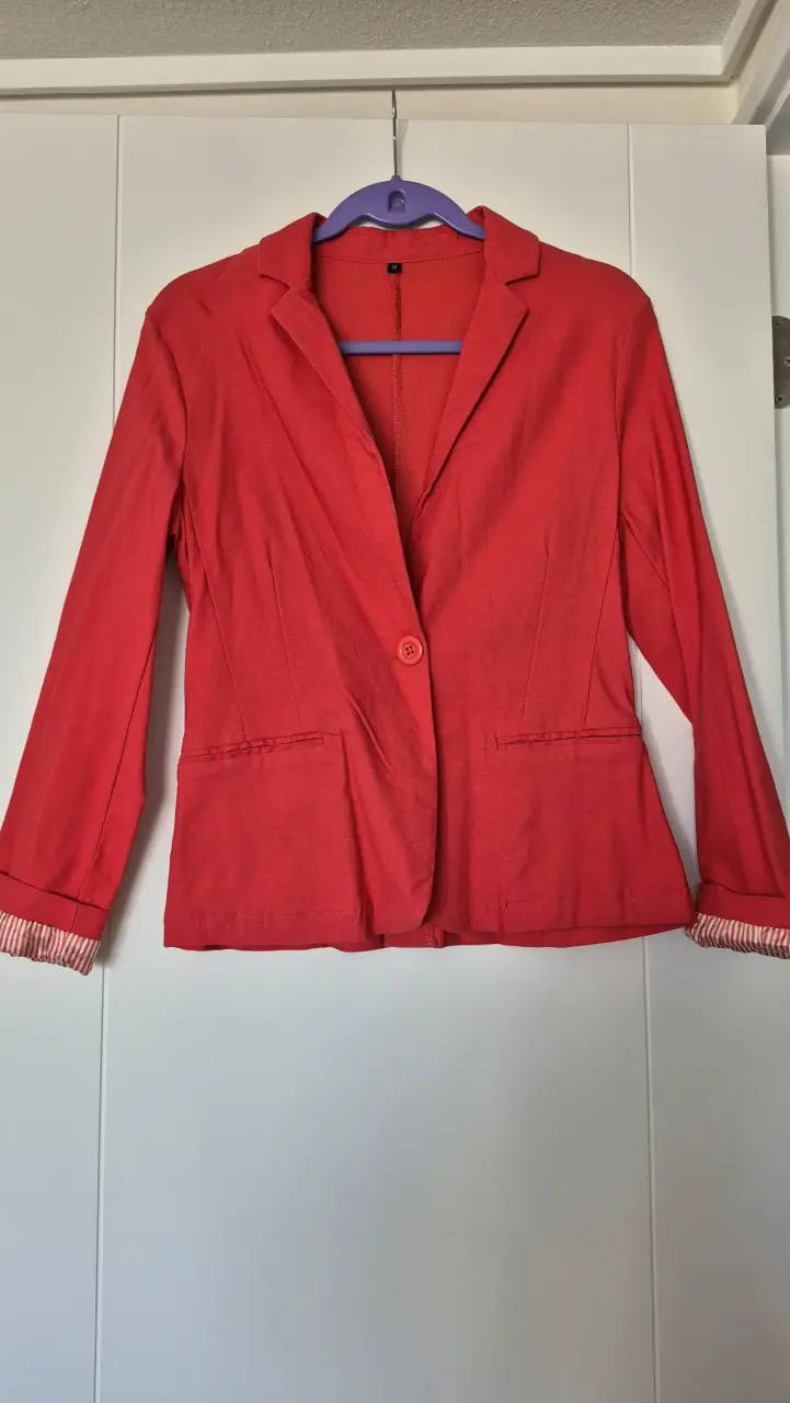 Blazer coral para mujer en buen estado